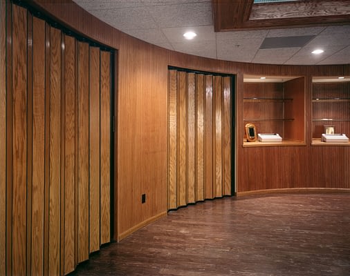 Image of wood curved accordion walls
