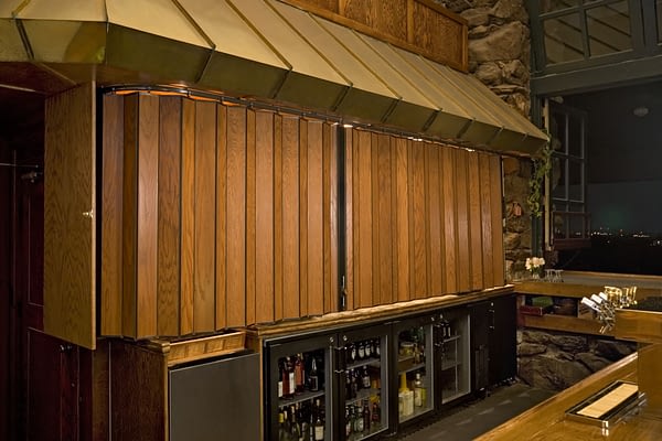 Image of wood curved accordion walls for a bar