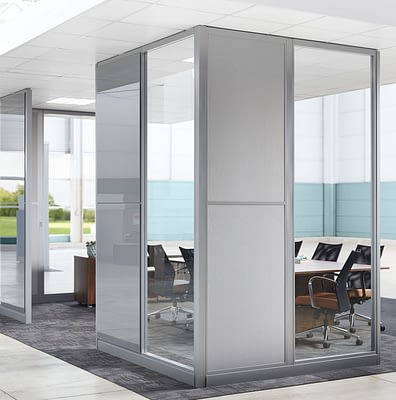 Image of conference room with both solid and clear architectural glass walls