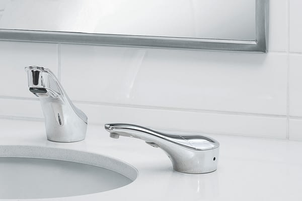 View of on the counter polished chrome soap dispenser