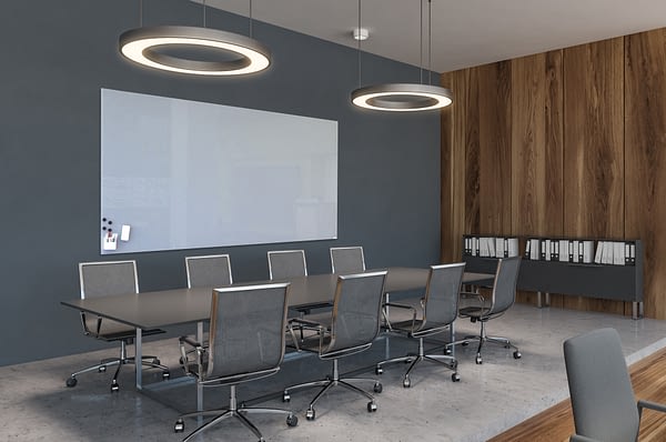 Corner of stylish meeting room with gray and wooden walls, concrete floor, long gray table with chairs and round ceiling lamps. Concept of negotiation. 3d rendering